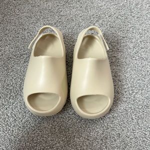 Toddler slip on sandals , water resistant shoes .